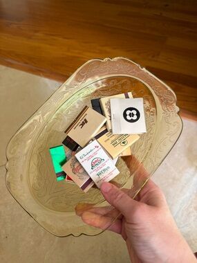 Vintage matchbooks in federal glass bowl